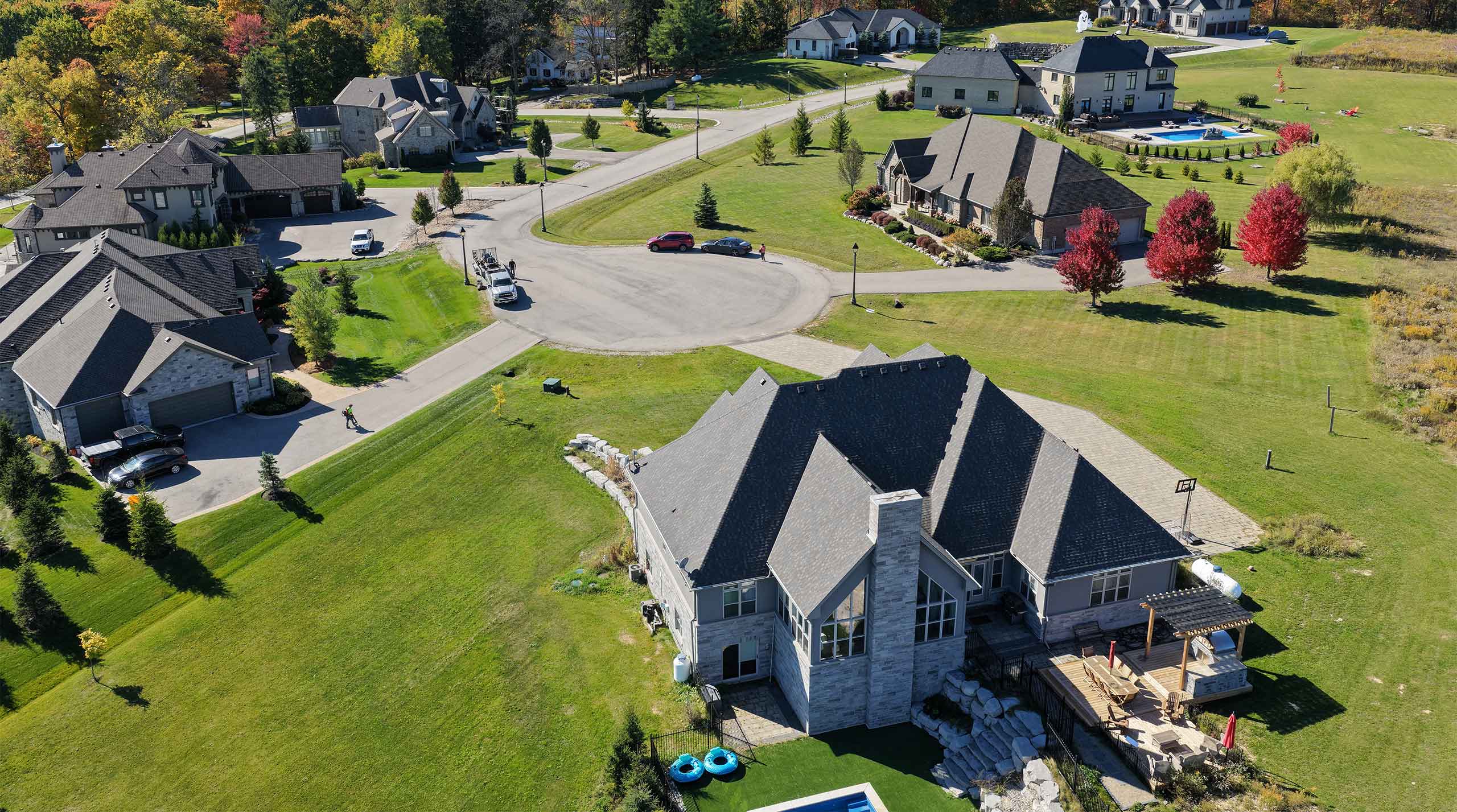 Aerial view of a residential property and neighbourhood